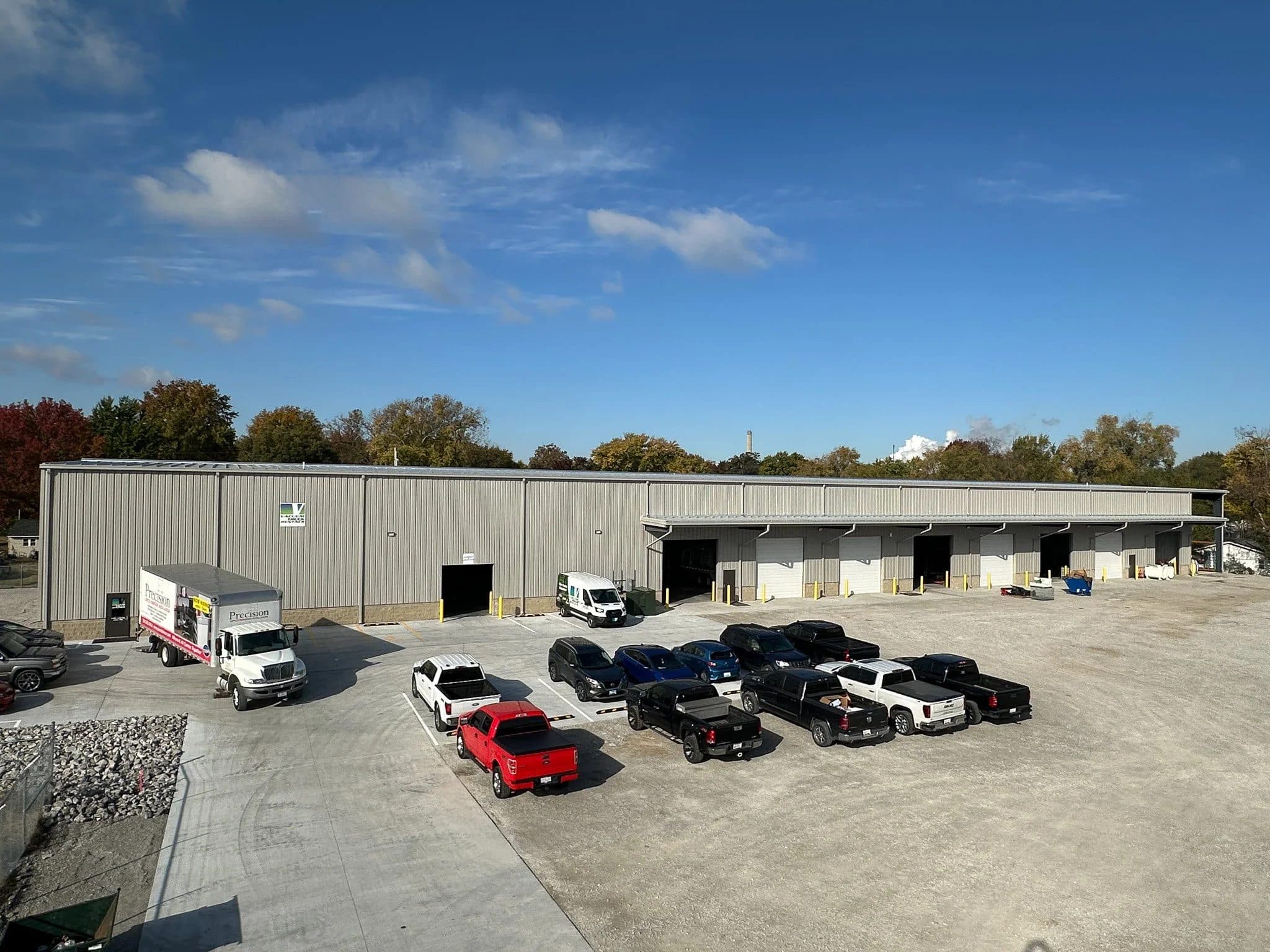 Completed pre-engineered metal warehouse with drive-in bays built by Klemme Construction in Roxana, IL